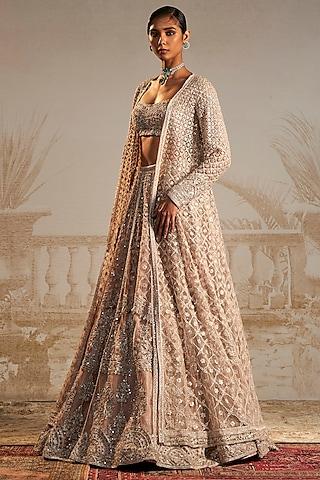 champagne net floral motifs embroidered jacket lehenga set