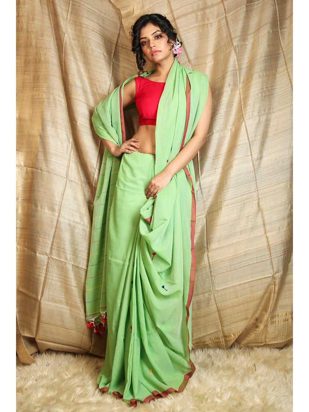 charukriti green & magenta floral thread work saree
