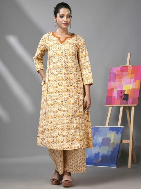 charukriti beige cotton printed kurta palazzo set