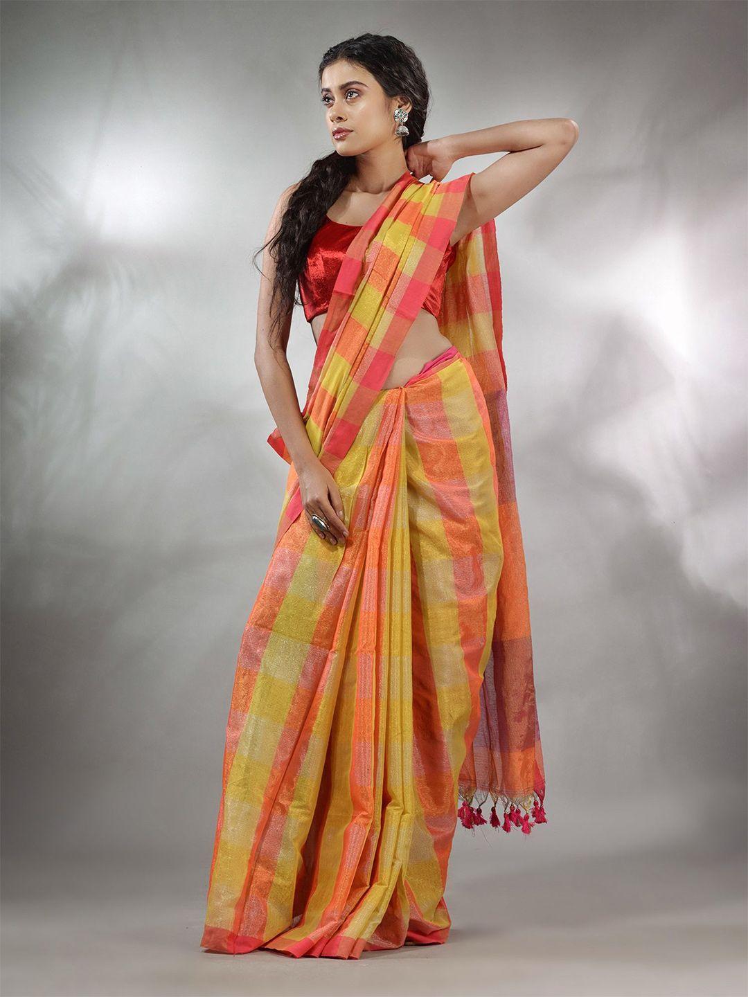 charukriti checked tissue saree