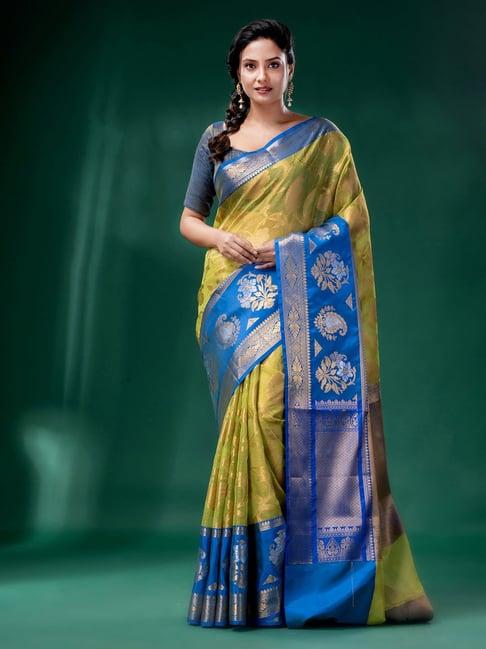 charukriti light green organza woven saree with blouse