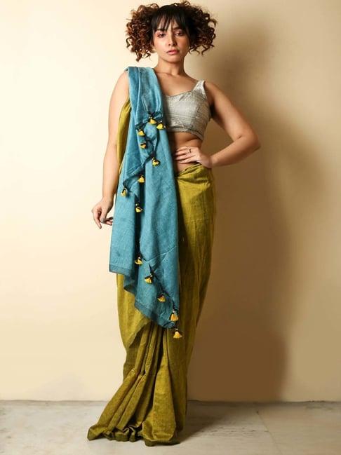 charukriti olive green cotton saree with unstitched blouse