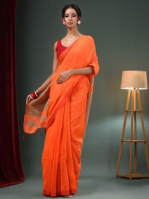 charukriti orange striped saree with unstitched blouse