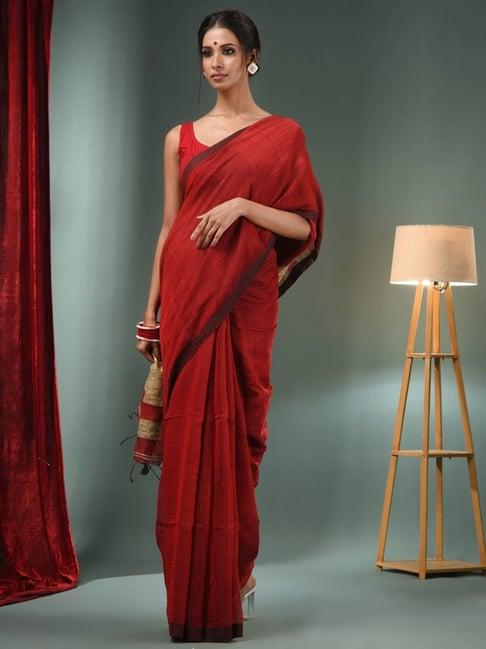 charukriti red embellished saree with unstitched blouse