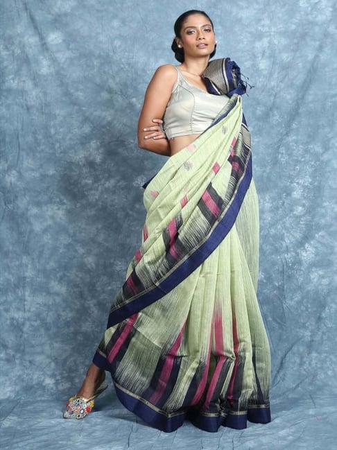 charukriti sage green woven saree with unstitched blouse