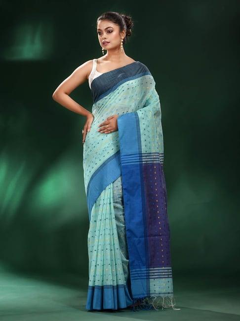 charukriti sea green polka dot saree with blouse