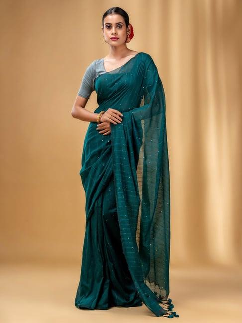 charukriti teal green cotton embellished saree with unstitched blouse