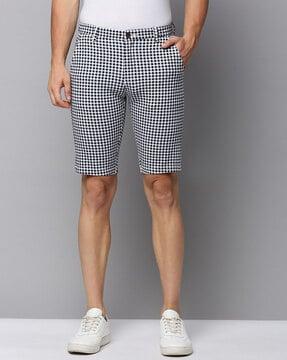 checked city shorts with button closure