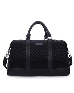 checked duffle bag with detachable shoulder strap