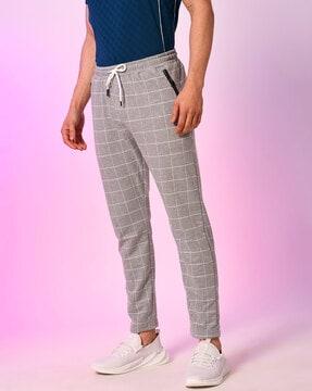 checked fitted track pants with drawstring waist