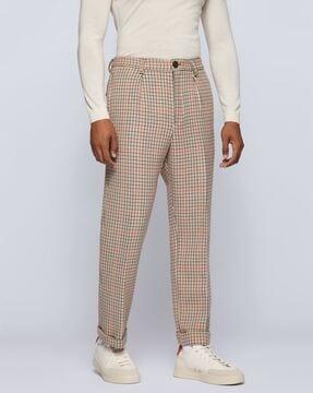 checked flat-front trousers