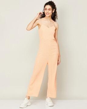 checked jumpsuit with chain closure