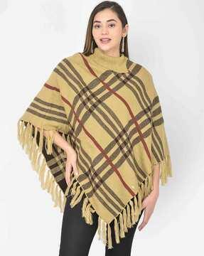 checked poncho with tassels