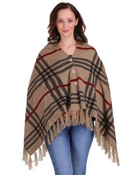checked poncho with tassels