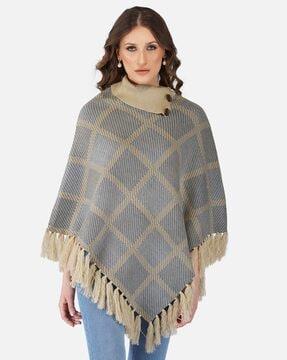 checked poncho with tassels