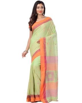 checked printed saree with tassels