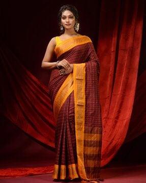 checked saree with tassels