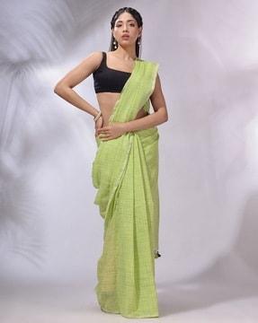 checked saree with tassels