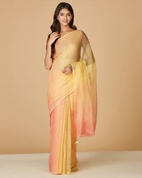 checked saree with tassels