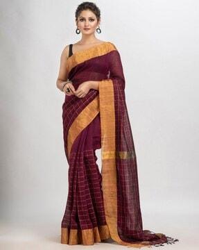 checked saree with tassels