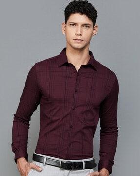 checked shirt with cuffed sleeves