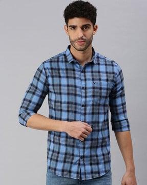 checked shirt with roll-up sleeves