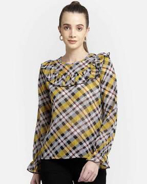 checked top with ruffled panel