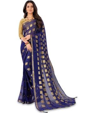 checked woven traditional saree with tassels