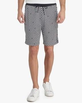 checkerboard logo print shorts