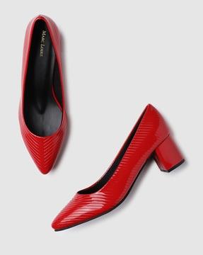 chevron pattern pointed-toe pumps