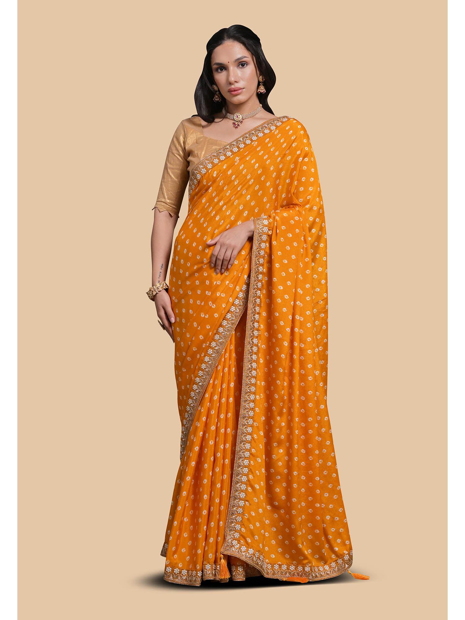 chinon all over printed and border embroidered mustard saree with unstitched blouse