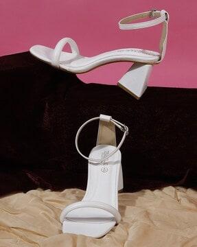 chunky heeled sandals with buckle fastening