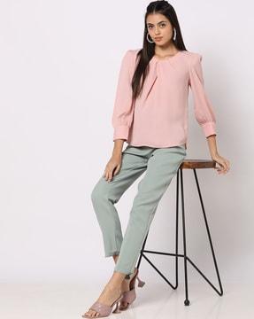 cinched top with cuffed sleeves
