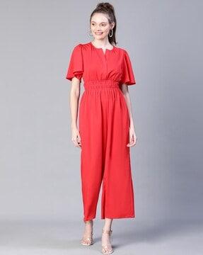 cinched waist jumpsuit with bell sleeves