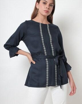 cinched waist top with embroidery