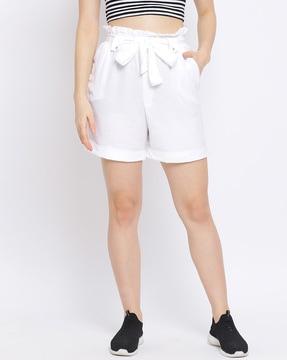 city shorts with bow accent