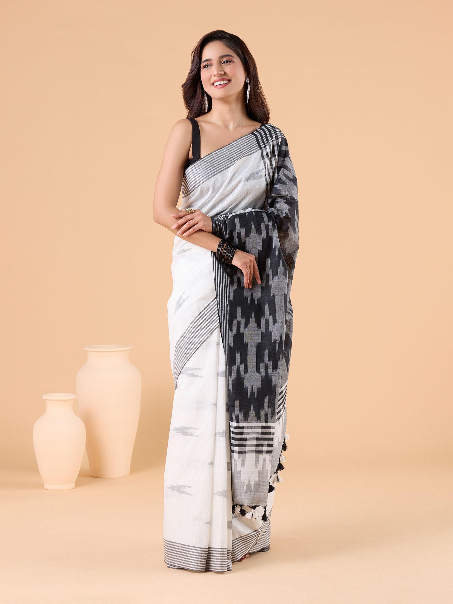 classy ekat motifs with border & contrast black pallu white saree & unstitched blou