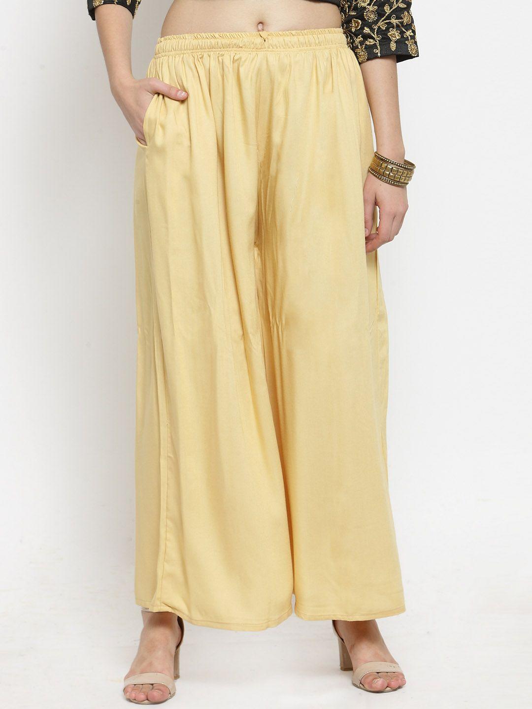 clora creation women yellow flared solid palazzos