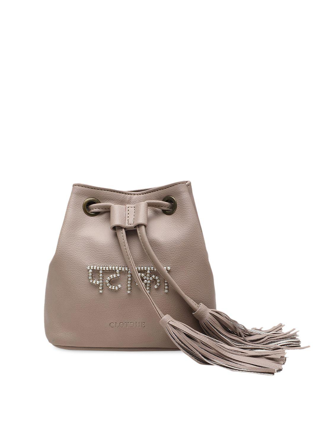 clotche beige pu bucket sling bag with bow detail