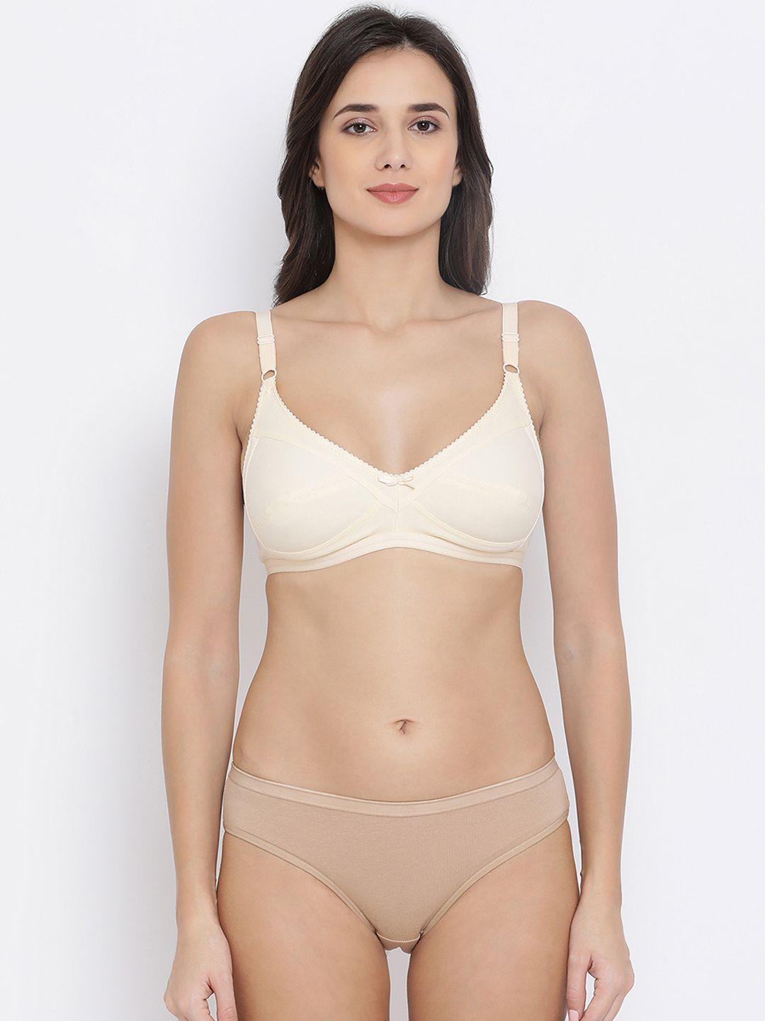 clovia women nude-coloured & cream-coloured solid lingerie set combbp24432b