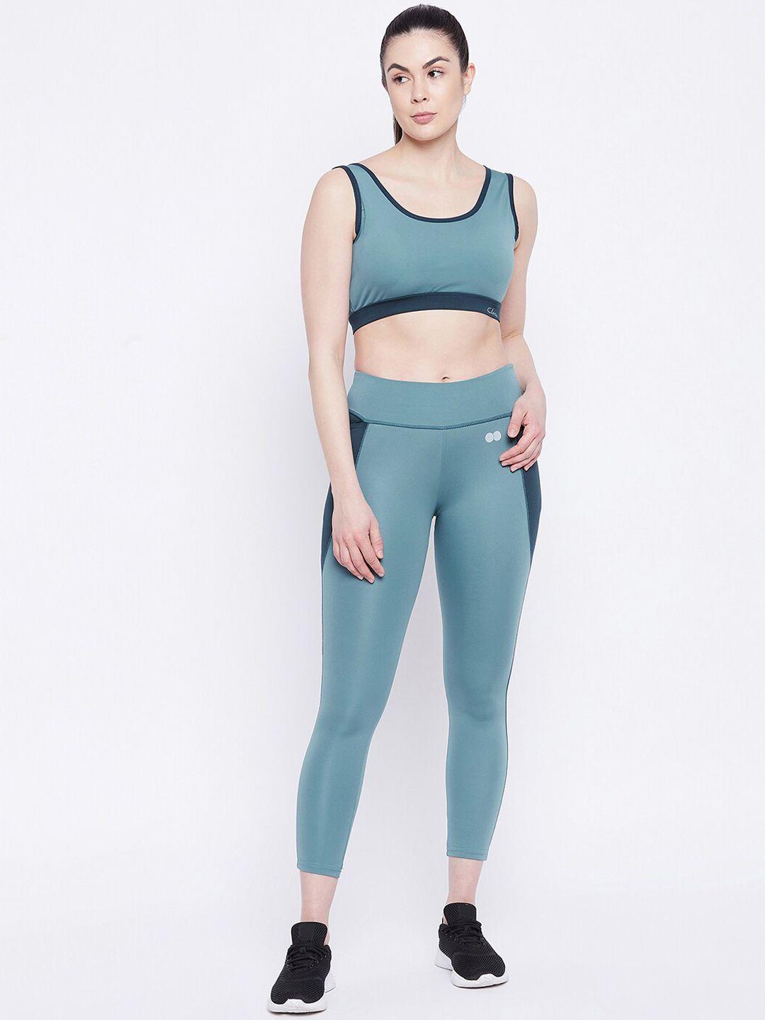 clovia women teal & black padded non wired sports bra with tights