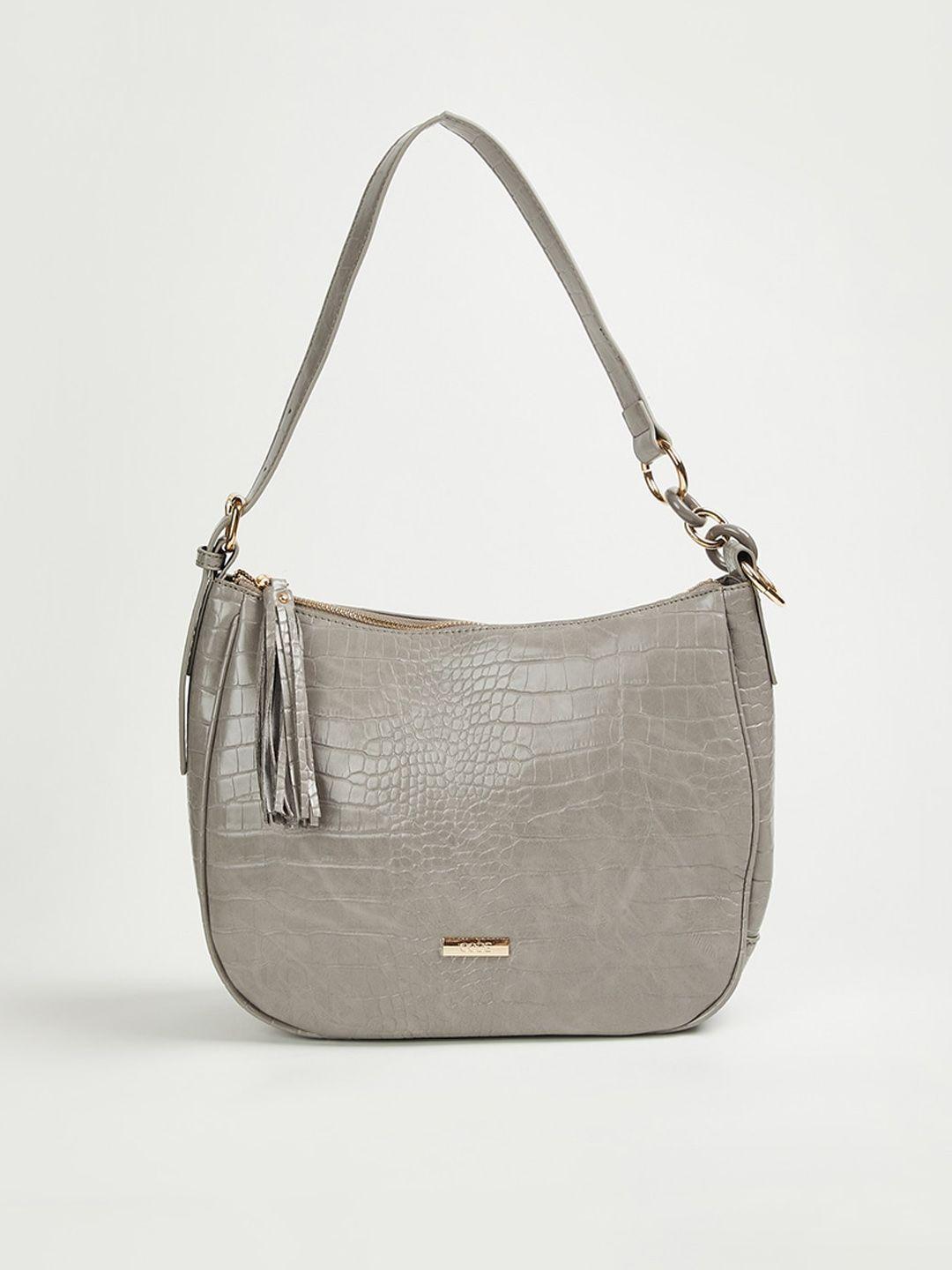 code by lifestyle grey half moon hobo bag with tasselled