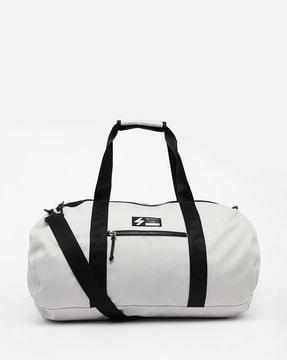 code barrel bag with detachable sling strap