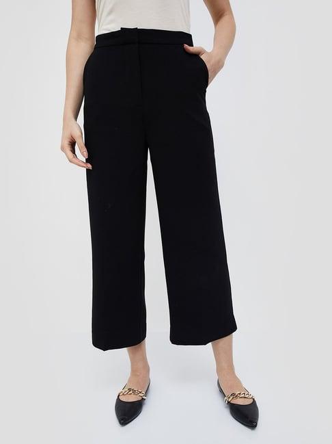 code by lifestyle black regular fit mid rise trousers