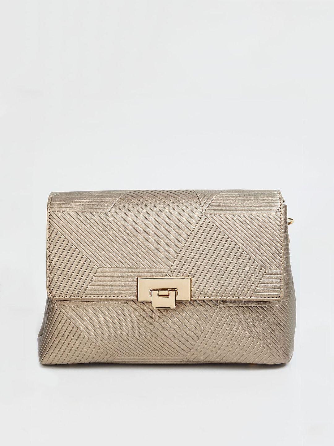 code by lifestyle champagne textured sling bag