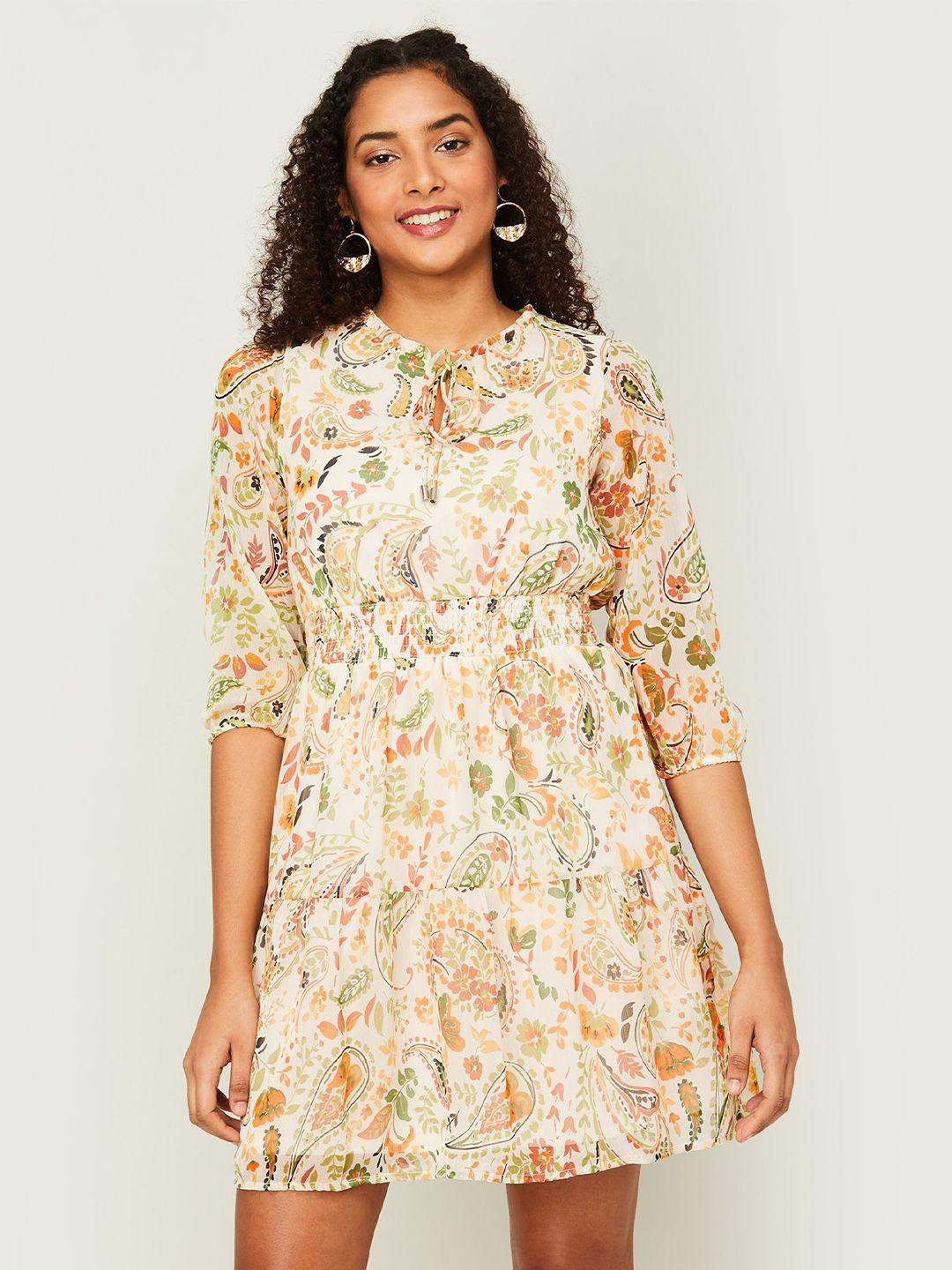 code by lifestyle floral tie-up neck puff sleeves dress
