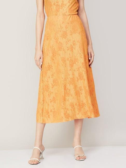 code by lifestyle orange printed a-line skirt
