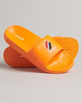 code essential brand embossed pool slides