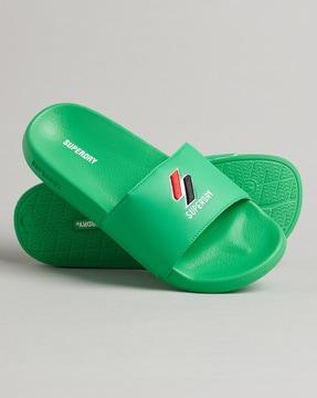 code essential brand embossed pool slides