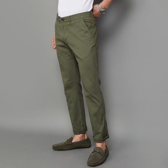 code men solid slim tapered casual trousers